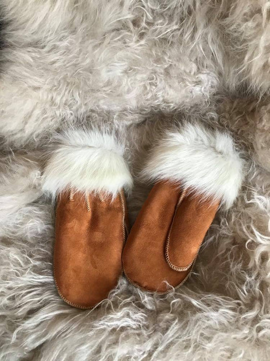 Rulams luffer med hvid pels, brun