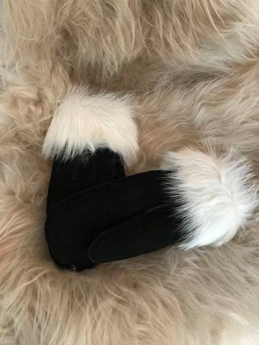 Rulams luffer med hvid pels, sort